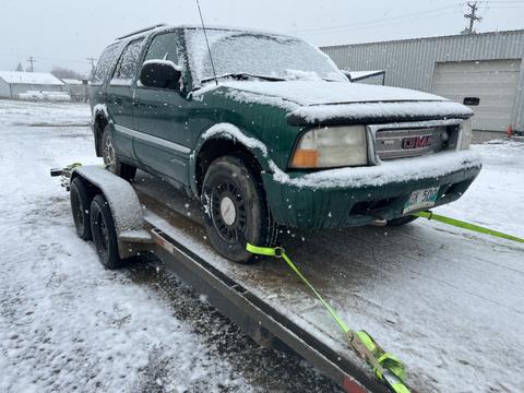 SMASH Cars | GMC Envoy on Trailer for Scrap Metal Recycling