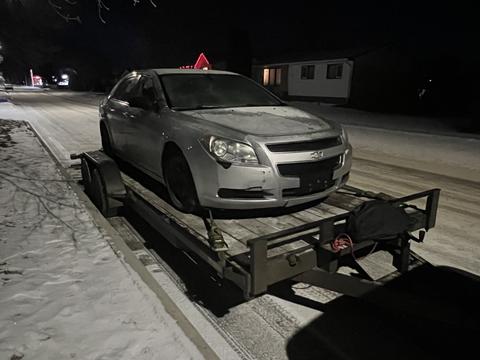 SMASH Cars | Silver Chevrolet Malibu on Trailer for Junk Car Removal