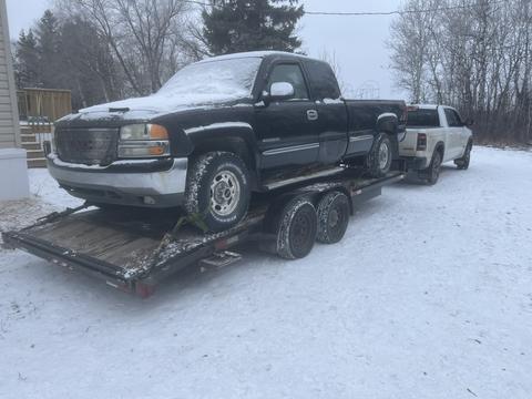 SMASH Cars | Junk Car Removal of GMC Sierra on Trailer for Scrap Metal Recycling