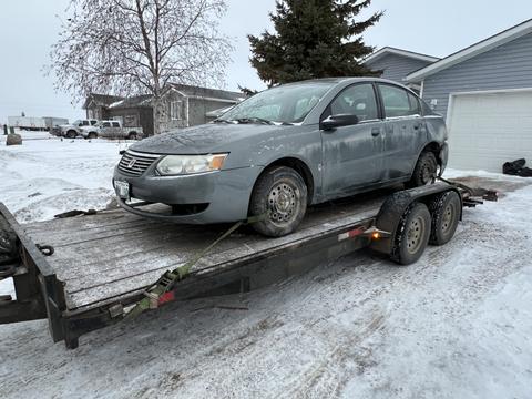 SMASH Cars | Junk Car Removal of a Gray Saturn on Trailer
