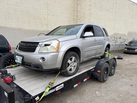SMASH Cars | Silver Chevrolet Equinox on Trailer for Scrap Metal Recycling