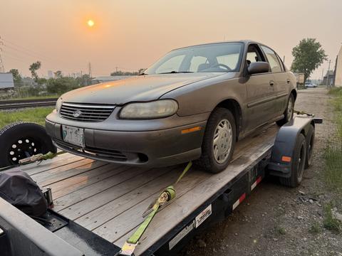 SMASH Cars | Junk Car Chevrolet Malibu on Trailer for Scrap Metal Recycling