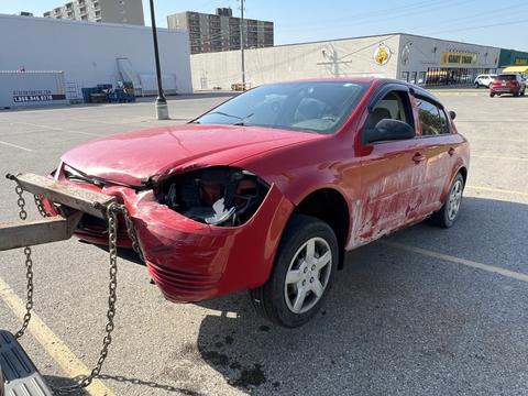 SMASH Cars | Damaged Red Sedan for Scrap Metal Recycling