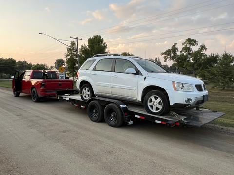SMASH Cars | Pontiac SUV on Trailer for Scrap Metal Recycling