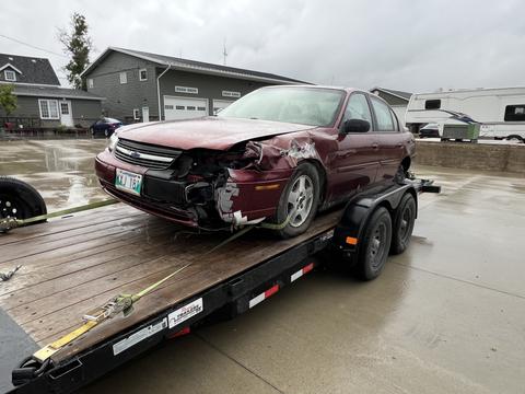 SMASH Cars | Junk Car Removal of a Damaged Chevrolet Sedan